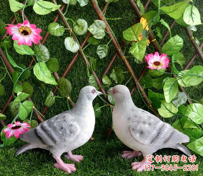 太原雕塑小女孩一只手拿书一手和平鸽