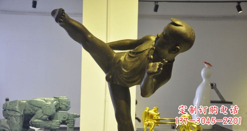 太原领雕塑男孩练功夫铜雕