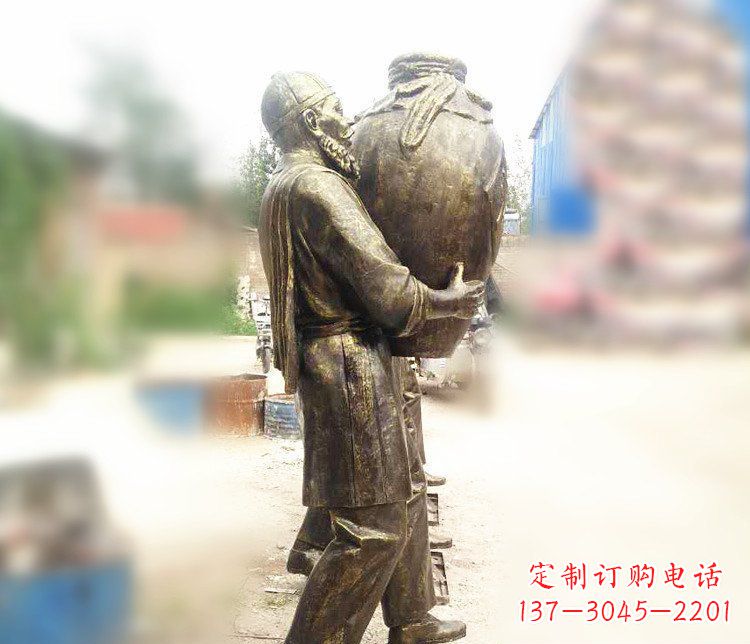 太原铜雕店小二抱酒人物雕塑
