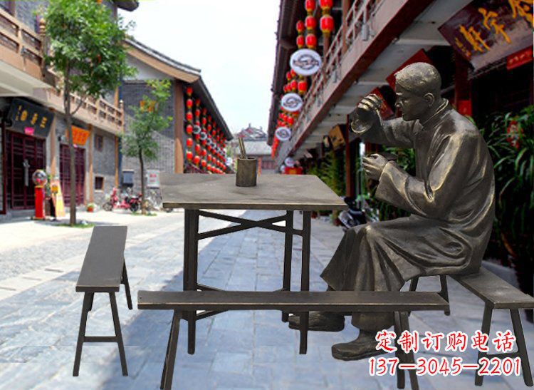 太原享受下午茶时光的店小二喝茶雕塑