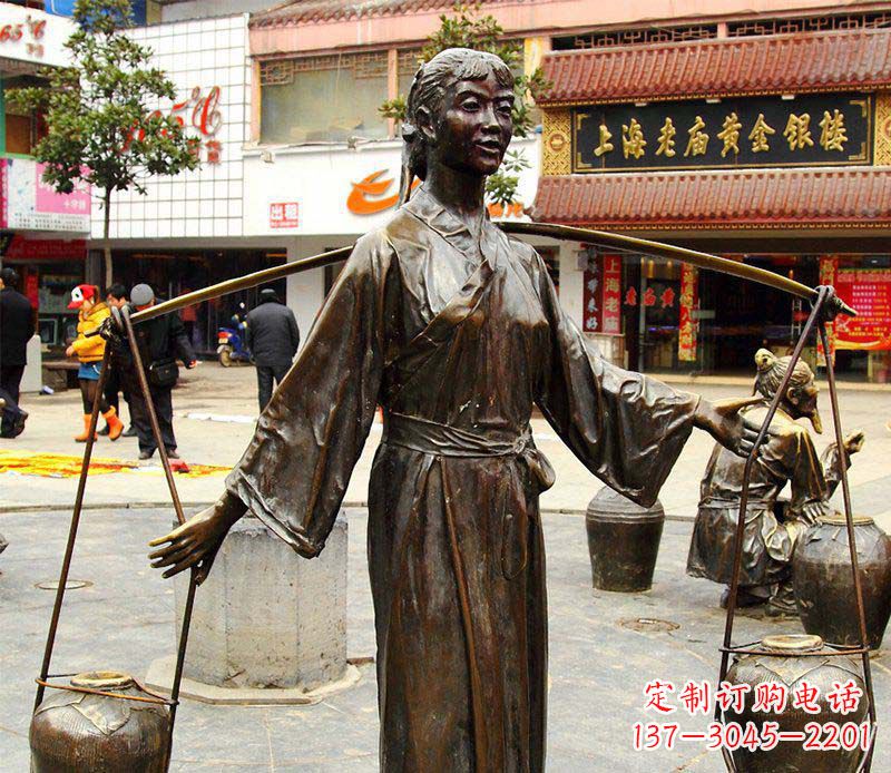太原挑着罐子的古代女人铜雕