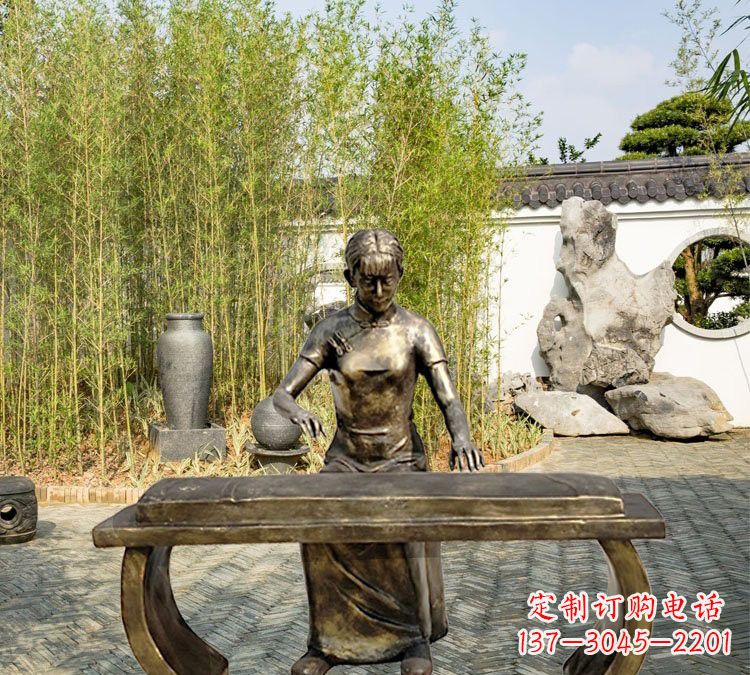 太原铜雕弹古筝人物