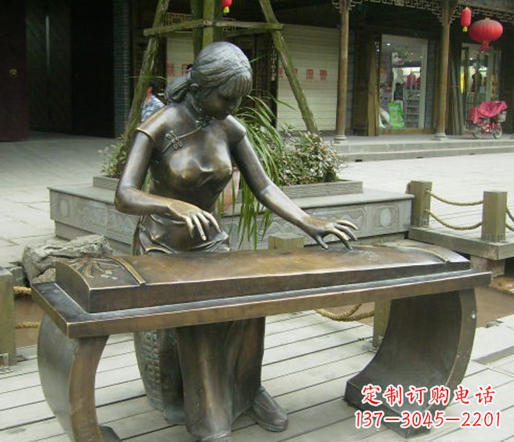 太原铜雕现代人物弹古筝雕塑
