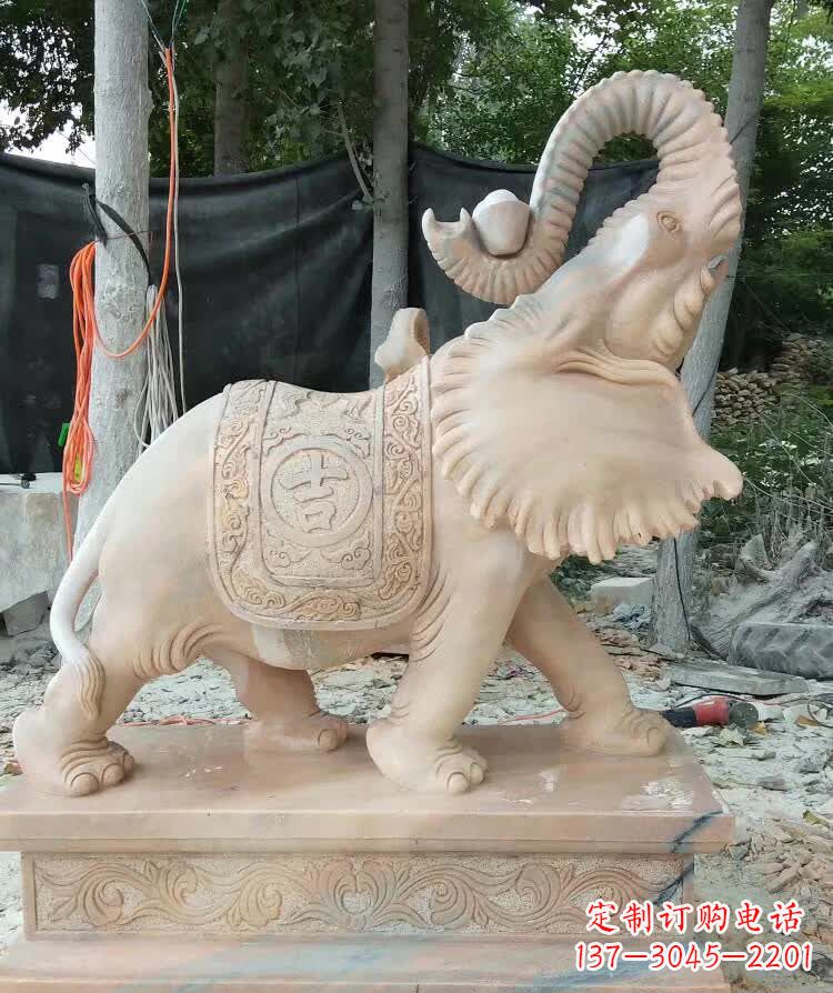 太原晚霞红卷元宝大象雕塑